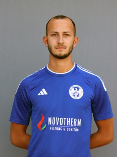 Justin Janik Daupert