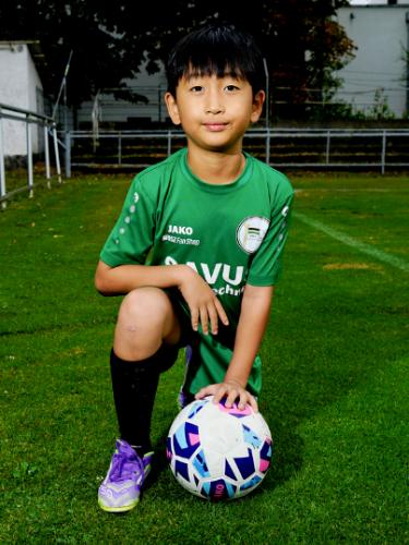 Yujun Kang